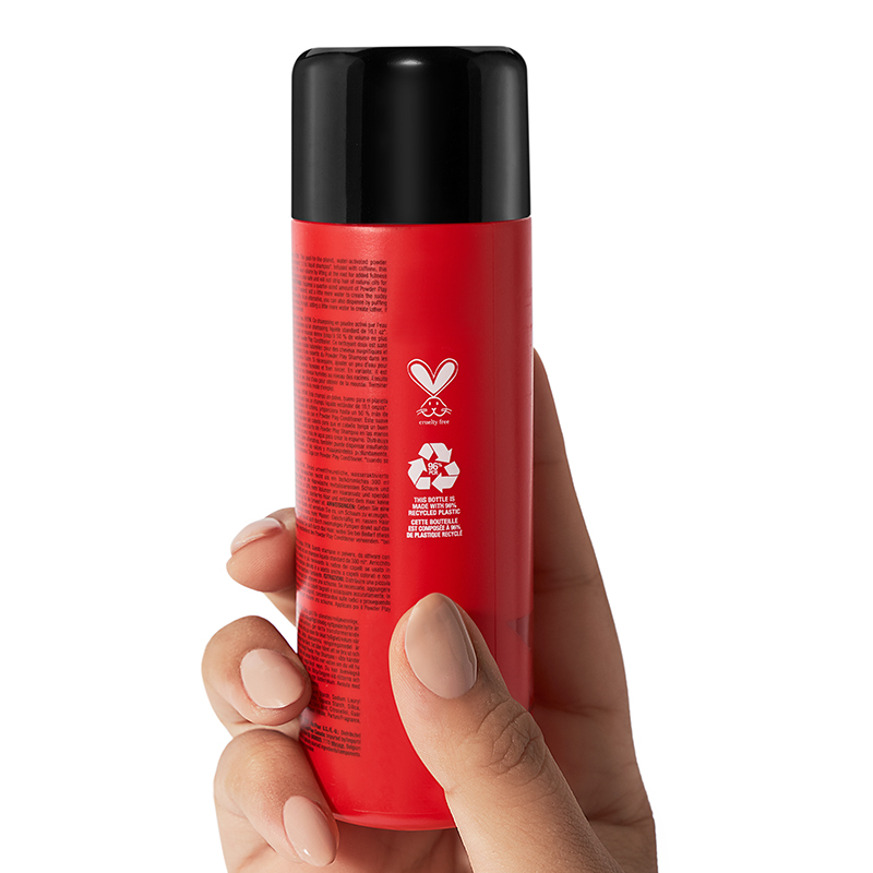hand holding big product label