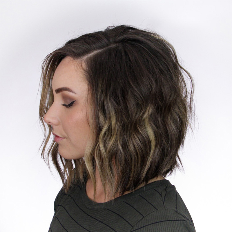 female model curls on short hair side