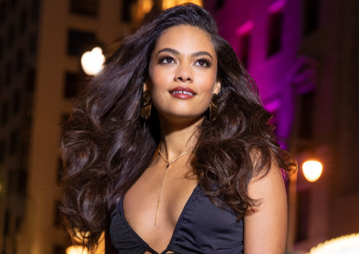 female model with long wavy hair at night