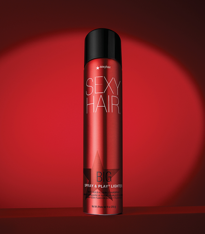 a picture of big sexyhair spray and play lighter on a red background